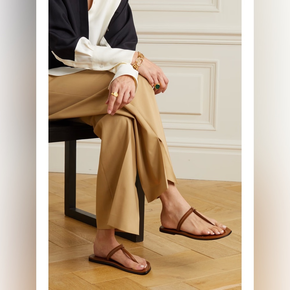 TOTEME
The T-strap leather sandals